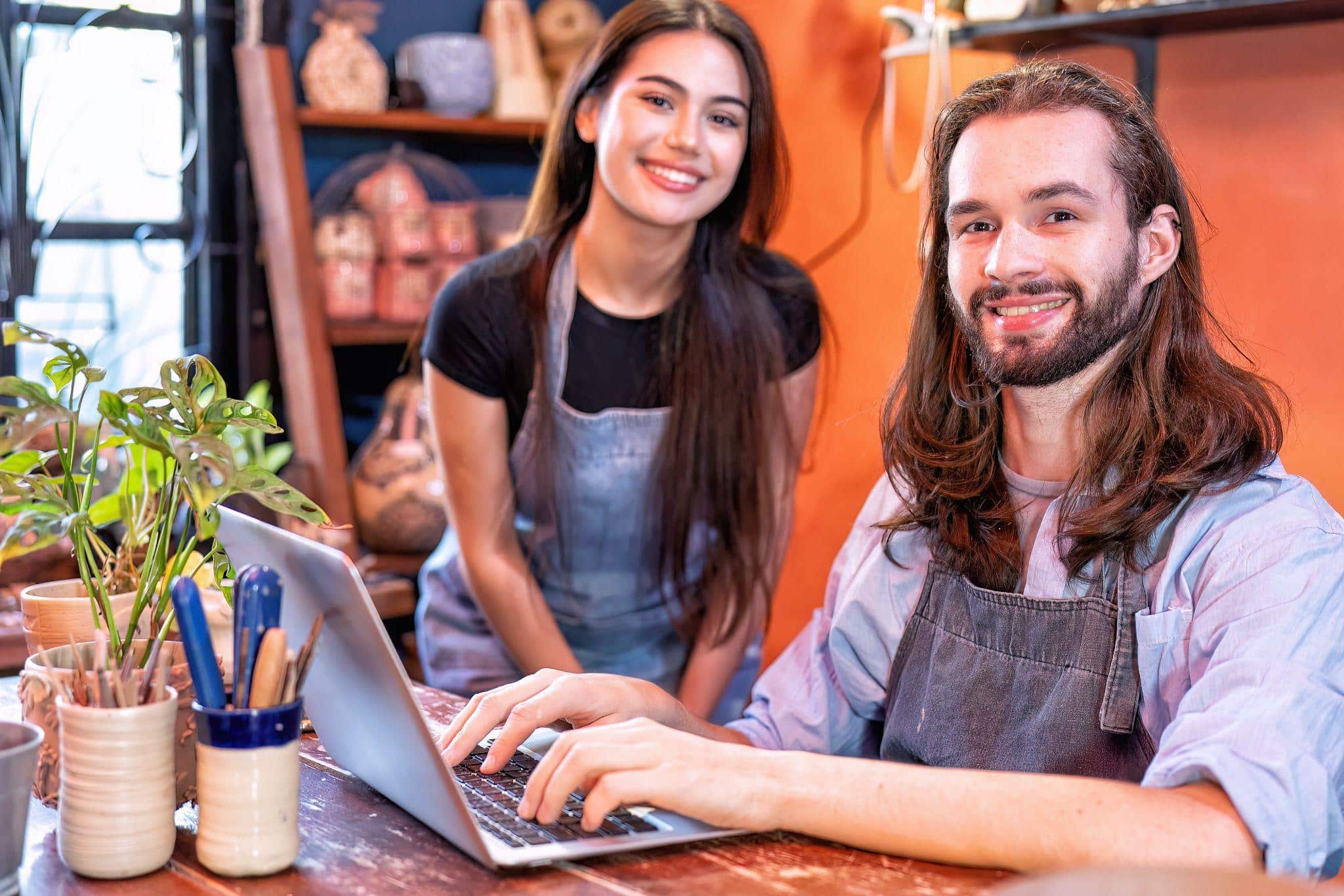 man and woman in pottery shop, trying to do local SEO citations