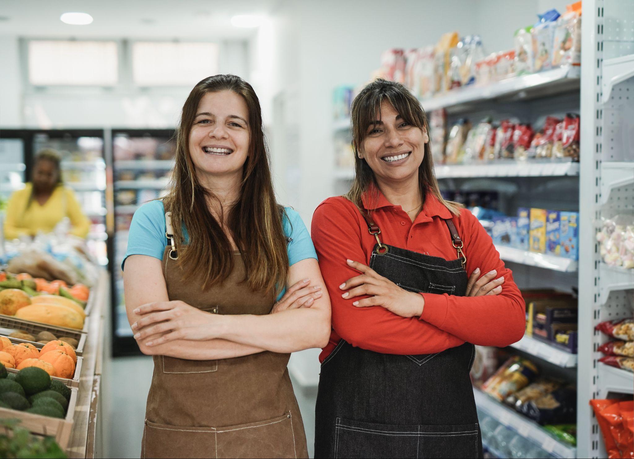 two people working in a grocery store